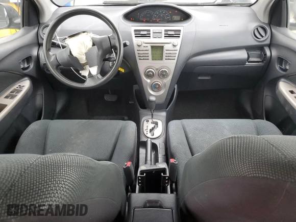 2009 Toyota Yaris with VIN JTDBT903291324461, listed as a Copart auction lot 54769875 with 141,777 mi miles and Salvage Title. Bid and sale history available at DreamBid. Image 8.