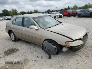 2001 Nissan Altima GXE with VIN 1N4DL01D81C242292, listed as a Copart auction lot 72706494 with 0 mi miles and Salvage Title. Bid and sale history available at carsss.com. Image 4.