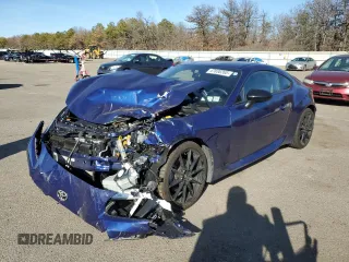 2023 Toyota 86 Premium z VIN JF1ZNBE14P9758330, wystawiony jako Copart lot #47830265 z przebiegiem 13 021 mil mil oraz Szkoda całkowita • Salvage title. Historia ofert i sprzedaży dostępna na DreamBid. Obrazek 1.