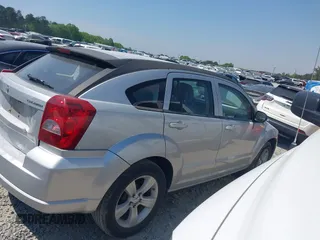 2011 Dodge Caliber Mainstreet with VIN 1B3CB3HAXBD107494, listed as a IAAI auction lot 42071328 with 146,936 mi miles. Bid and sale history available at carsss.com. Image 13.