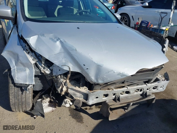 2012 Ford Focus SE with VIN 1FAHP3K27CL416859, listed as a IAAI auction lot 41418565 with 114,525 mi miles. Bid and sale history available at carsss.com. Image 6.