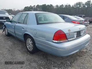 2003 Ford Crown Victoria LX z VIN 2FAFP74W83X180076, wystawiony jako IAAI lot #41744980 z przebiegiem 254 465 mil mil oraz . Historia ofert i sprzedaży dostępna na DreamBid. Obrazek 3.