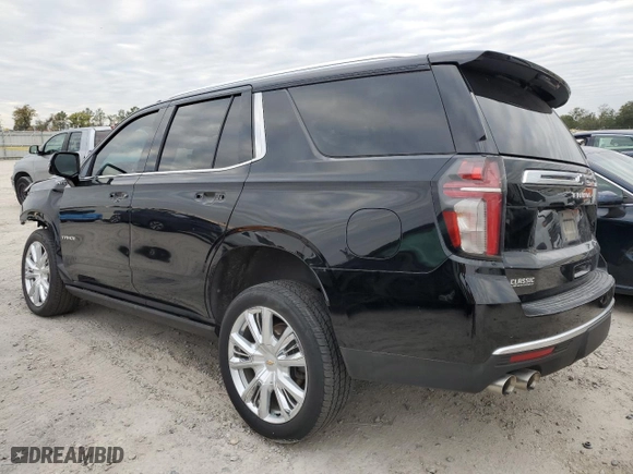 2021 Chevrolet Tahoe High Country with VIN 1GNSCTKL3MR183802, listed as a Copart auction lot 77540973 with 57,283 mi miles and Salvage Title. Bid and sale history available at carsss.com. Image 2.