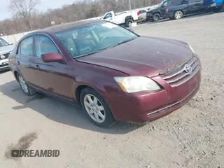 2005 Toyota Avalon XL with VIN 4T1BK36B25U057969, listed as a IAAI auction lot 41798579 with 241,831 mi miles. Bid and sale history available at carsss.com. Image 1.