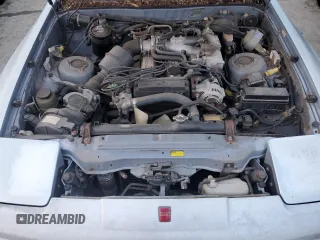 1986 Toyota Supra z VIN JT2MA70L4G0016772, wystawiony jako Copart lot #85806484 z przebiegiem 128 504 mil mil oraz Czysty tytuł • Clean title. Historia ofert i sprzedaży dostępna na DreamBid. Obrazek 11.