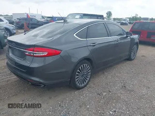 2017 Ford Fusion SE with VIN 3FA6P0T9XHR186017, listed as a IAAI auction lot 42535725 with 166,794 mi miles and . Bid and sale history available at DreamBid. Image 4.
