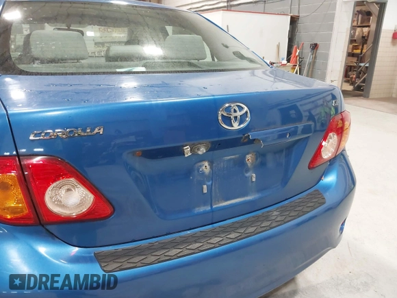 2009 Toyota Corolla with VIN JTDBL40E699037792, listed as a IAAI auction lot 41838231 with 199,690 mi miles. Bid and sale history available at carsss.com. Image 14.