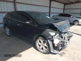 2010 Mazda CX-7 Touring z VIN JM3ER2W32A0339750, wystawiony jako IAAI lot #42248777 z przebiegiem 124 181 mil mil oraz . Historia ofert i sprzedaży dostępna na DreamBid. Obrazek 1.