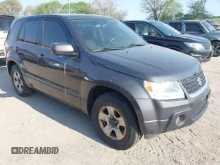 2012 Suzuki Grand Vitara Premium z VIN JS3TD0D22C4101455, wystawiony jako IAAI lot #42211776 z przebiegiem 153 569 mil mil oraz . Historia ofert i sprzedaży dostępna na DreamBid. Obrazek 1.