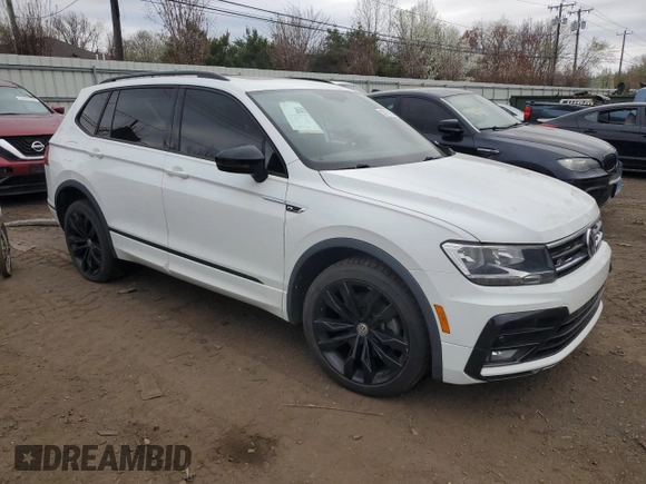 2021 Volkswagen Tiguan SE with VIN 3VV2B7AX8MM021965, listed as a Copart auction lot 53711125 with 59,554 mi miles and Salvage Title. Bid and sale history available at DreamBid. Image 4.