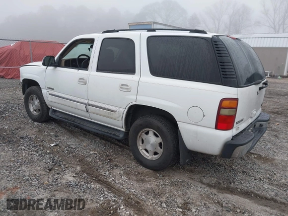 2003 GMC Yukon SLT with VIN 1GKEC13Z33R175358, listed as a IAAI auction lot 41801299 with 269,167 mi miles. Bid and sale history available at carsss.com. Image 3.