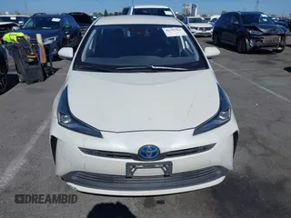 2020 Toyota Prius L Eco with VIN JTDKARFUXL3107211, listed as a IAAI auction lot 42797561 with 328,023 mi miles and . Bid and sale history available at DreamBid. Image 12.