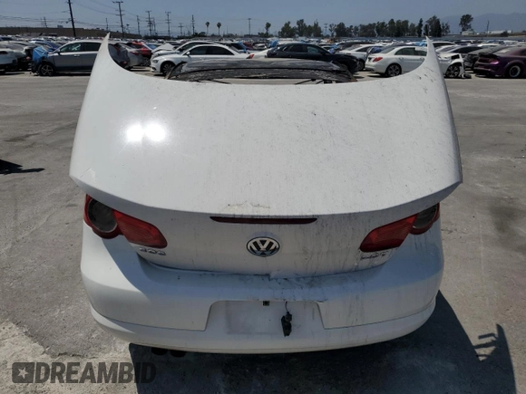 2009 Volkswagen Eos Komfort z VIN WVWBA71F49V023797, wystawiony jako Copart lot #58764645 z przebiegiem Nie podano mil oraz Nie do naprawy • Non repairable. Historia ofert i sprzedaży dostępna na DreamBid. Obrazek 6.