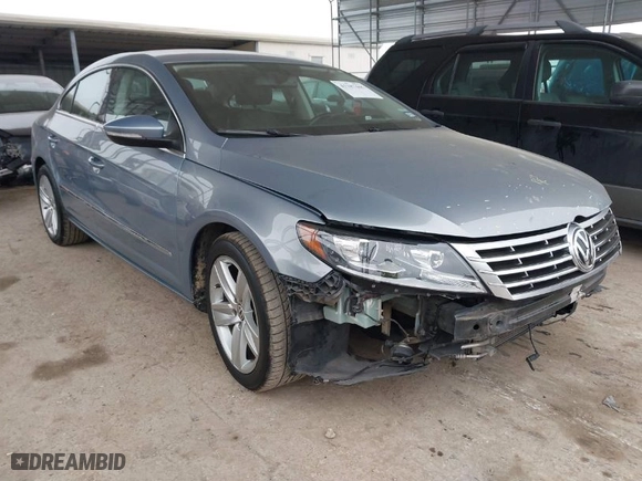 2013 Volkswagen CC Sport with VIN WVWBN7AN8DE560127, listed as a IAAI auction lot 41187465 with 157,182 mi miles. Bid and sale history available at carsss.com. Image 1.