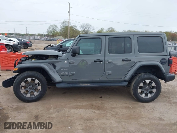 2022 Jeep Wrangler Unlimited Sahara with VIN 1C4HJXEG7NW138105, listed as a IAAI auction lot 42146898 with Not provided miles and . Bid and sale history available at DreamBid. Image 15.