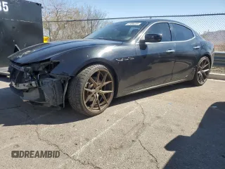 2014 Maserati Ghibli z VIN ZAM57XSA5E1086452, wystawiony jako Copart lot #47496255 z przebiegiem 75 970 mil mil oraz Szkody całkowita. Historia ofert i sprzedaży dostępna na DreamBid. Obrazek 1.