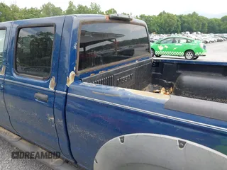 2002 Nissan Frontier XE with VIN 1N6ED29Y22C362795, listed as a IAAI auction lot 42432950 with 180,270 mi miles and . Bid and sale history available at DreamBid. Image 12.