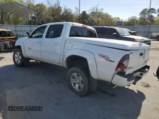 2010 Toyota Tacoma PreRunner with VIN 5TEJU4GN9AZ691581, listed as a Copart auction lot 50878855 with 236,777 mi miles and Salvage Title. Bid and sale history available at DreamBid. Image 2.