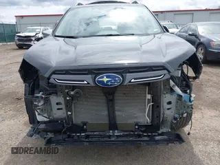 2023 Subaru Forester Touring with VIN JF2SKARC4PH485522, listed as a IAAI auction lot 42544425 with 38,872 mi miles and . Bid and sale history available at DreamBid. Image 6.