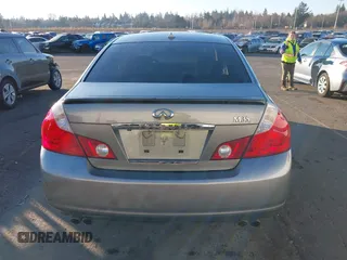 2006 Infiniti M z VIN JNKAY01E56M107083, wystawiony jako IAAI lot #41443347 z przebiegiem 162 191 mil mil oraz . Historia ofert i sprzedaży dostępna na DreamBid. Obrazek 16.