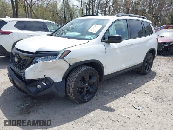 2021 Honda Passport Elite z VIN 5FNYF8H08MB014739, wystawiony jako IAAI lot #42137913 z przebiegiem 50 580 mil mil oraz . Historia ofert i sprzedaży dostępna na DreamBid. Obrazek 17.