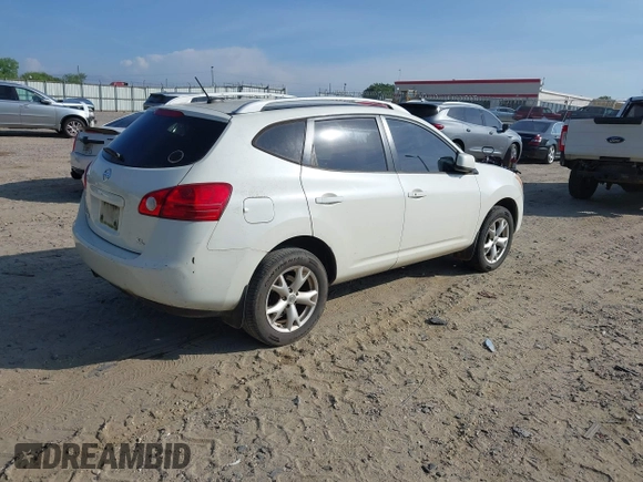 2009 Nissan Rogue SL with VIN JN8AS58T29W052173, listed as a IAAI auction lot 42161307 with 186,340 mi miles and . Bid and sale history available at DreamBid. Image 4.