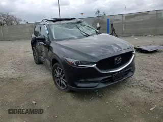 2018 Mazda CX-5 Grand Touring with VIN JM3KFADM3J1370114, listed as a Copart auction lot 54579585 with 65,513 mi miles and Salvage Title. Bid and sale history available at DreamBid. Image 14.
