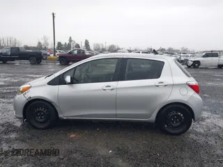 2013 Toyota Yaris L with VIN JTDKTUD32DD553842, listed as a IAAI auction lot 41231910 with 155,158 mi miles. Bid and sale history available at carsss.com. Image 14.
