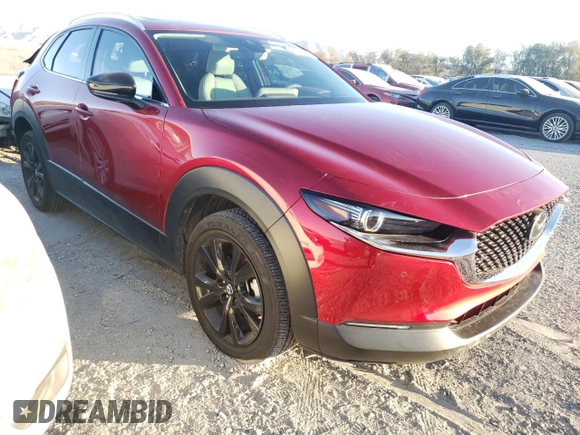 2023 Mazda CX-30 Premium Plus with VIN 3MVDMBEY5PM569612, listed as a Copart auction lot 85348014 with 17,217 mi miles and Salvage title. Bid and sale history available at DreamBid. Image 4.