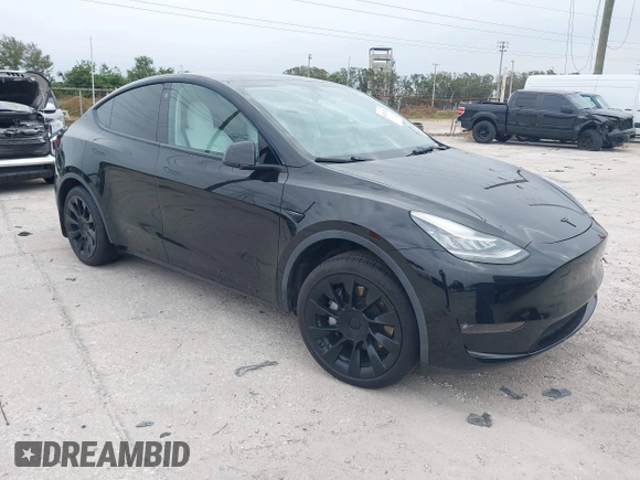 2021 Tesla Model Y Standard Range with VIN 5YJYGDED8MF123246, listed as a IAAI auction lot 41291676 with 74,630 mi miles and . Bid and sale history available at DreamBid. Image 1.