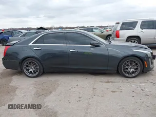 2014 Cadillac CTS Vsport Premium RWD z VIN 1G6AV5S8XE0175517, wystawiony jako IAAI lot #41126885 z przebiegiem 140 667 mil mil oraz . Historia ofert i sprzedaży dostępna na DreamBid. Obrazek 13.