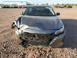 2024 Nissan Sentra S z VIN 3N1AB8BV3RY293064, wystawiony jako Copart lot #58260125 z przebiegiem 21 997 mil mil oraz Szkoda całkowita • Salvage title. Historia ofert i sprzedaży dostępna na DreamBid. Obrazek 5.