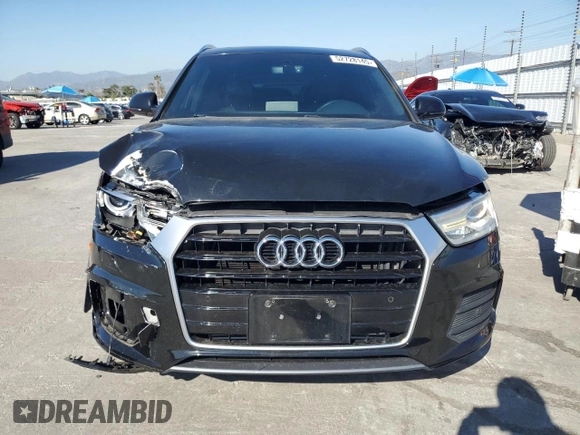 2017 Audi Q3 Premium Plus with VIN WA1HCCFS0HR009755, listed as a Copart auction lot 52728145 with 105,459 mi miles and Salvage title. Bid and sale history available at DreamBid. Image 5.