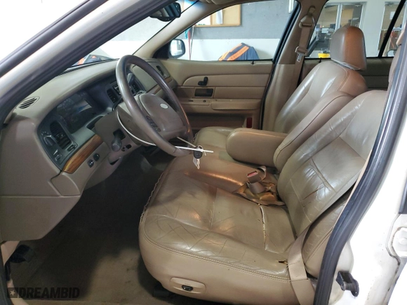 2003 Ford Crown Victoria LX with VIN 2FAFP74W23X134274, listed as a Copart auction lot 73295754 with 212,581 mi miles and Salvage Title. Bid and sale history available at carsss.com. Image 7.