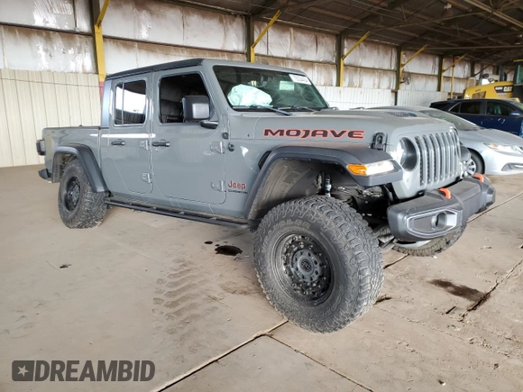 2020 Jeep Gladiator Mojave with VIN 1C6JJTEG1LL202459, listed as a Copart auction lot 79334434 with 49,515 mi miles and Salvage title. Bid and sale history available at DreamBid. Image 4.