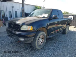 2003 Ford F-150 XL with VIN 2FTRX18L33CA96940, listed as a IAAI auction lot 42090248 with 229,260 mi miles. Bid and sale history available at carsss.com. Image 2.