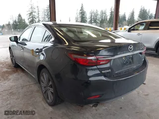 2021 Mazda Mazda6 Touring with VIN JM1GL1VM2M1604415, listed as a IAAI auction lot 41742448 with 103,776 mi miles. Bid and sale history available at carsss.com. Image 3.
