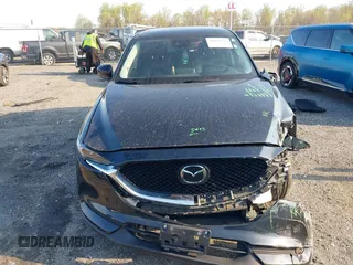 2019 Mazda CX-5 Grand Touring with VIN JM3KFBDM7K0525650, listed as a IAAI auction lot 42032757 with 65,530 mi miles and . Bid and sale history available at DreamBid. Image 13.