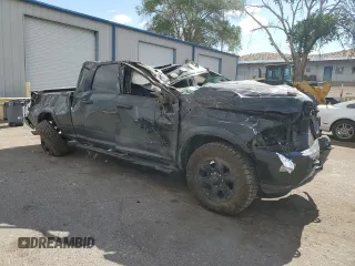 2018 Ram 2500 Laramie with VIN 3C6UR5NL7JG426666, listed as a Copart auction lot 56964865 with 77,686 mi miles and Salvage title. Bid and sale history available at DreamBid. Image 4.