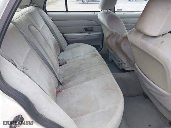 2003 Ford Crown Victoria LX with VIN 2FAFP74WX3X154904, listed as a IAAI auction lot 42094274 with 123,579 mi miles. Bid and sale history available at carsss.com. Image 8.