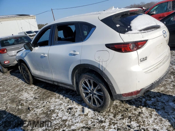 2021 Mazda CX-5 Signature with VIN JM3KFBEY5M0447759, listed as a Copart auction lot 42565535 with 24,175 mi miles and Salvage Title. Bid and sale history available at carsss.com. Image 2.