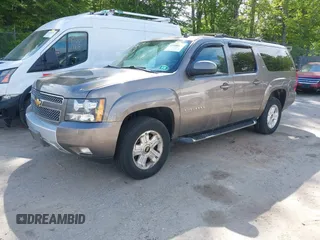 2012 Chevrolet Suburban LT z VIN 1GNSKJE74CR221767, wystawiony jako IAAI lot #42340815 z przebiegiem 219 966 mil mil oraz . Historia ofert i sprzedaży dostępna na DreamBid. Obrazek 2.