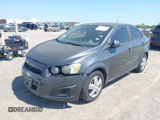 2013 Chevrolet Sonic LS with VIN 1G1JA5SH2D4112064, listed as a IAAI auction lot 42043168 with 215,480 mi miles and . Bid and sale history available at DreamBid. Image 2.