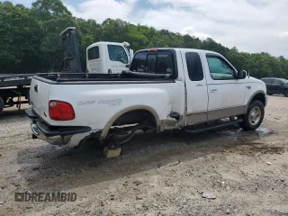 2001 Ford F-150 XL with VIN 1FTRX08L51KE49004, listed as a Copart auction lot 60470745 with 199,490 mi miles and Salvage title. Bid and sale history available at DreamBid. Image 3.