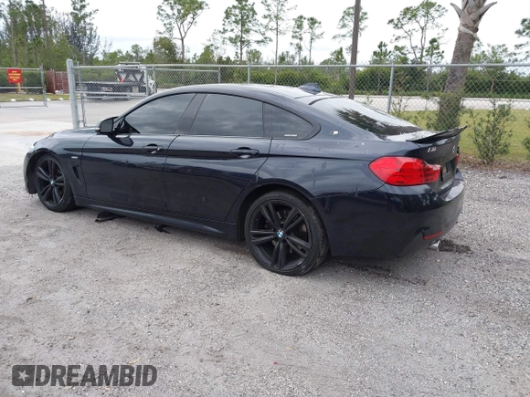 2015 BMW 4 Series 435i with VIN WBA4B1C5XFD955119, listed as a IAAI auction lot 41349918 with 181,937 mi miles and . Bid and sale history available at carsss.com. Image 3.