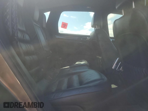 2011 Porsche Cayenne with VIN WP1AA2A28BLA04200, listed as a Copart auction lot 56824575 with 180,123 mi miles and Salvage title. Bid and sale history available at DreamBid. Image 11.