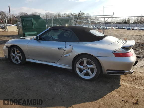 2004 Porsche 911 Carrera S with VIN WP0CB29954S676877, listed as a Copart auction lot 43008885 with 73,052 mi miles and Salvage Title. Bid and sale history available at DreamBid. Image 2.