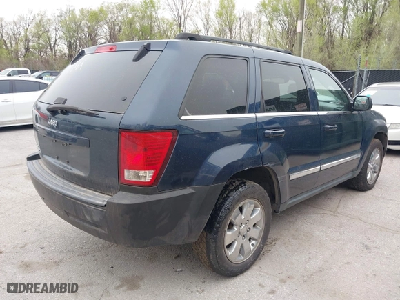 2009 Jeep Grand Cherokee Limited with VIN 1J8GR58K99C551782, listed as a IAAI auction lot 41817563 with 258,407 mi miles. Bid and sale history available at carsss.com. Image 4.