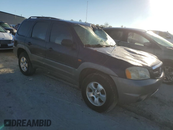 2002 Mazda Tribute LX with VIN 4F2YU09172KM62596, listed as a Copart auction lot 76912034 with 225,892 mi miles and Salvage Title. Bid and sale history available at carsss.com. Image 7.
