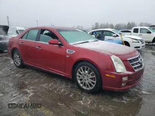 2010 Cadillac STS AWD z VIN 1G6DU6EV3A0131148, wystawiony jako Copart lot #44047375 z przebiegiem 147 556 mil mil oraz Szkoda całkowita • Salvage title. Historia ofert i sprzedaży dostępna na DreamBid. Obrazek 4.